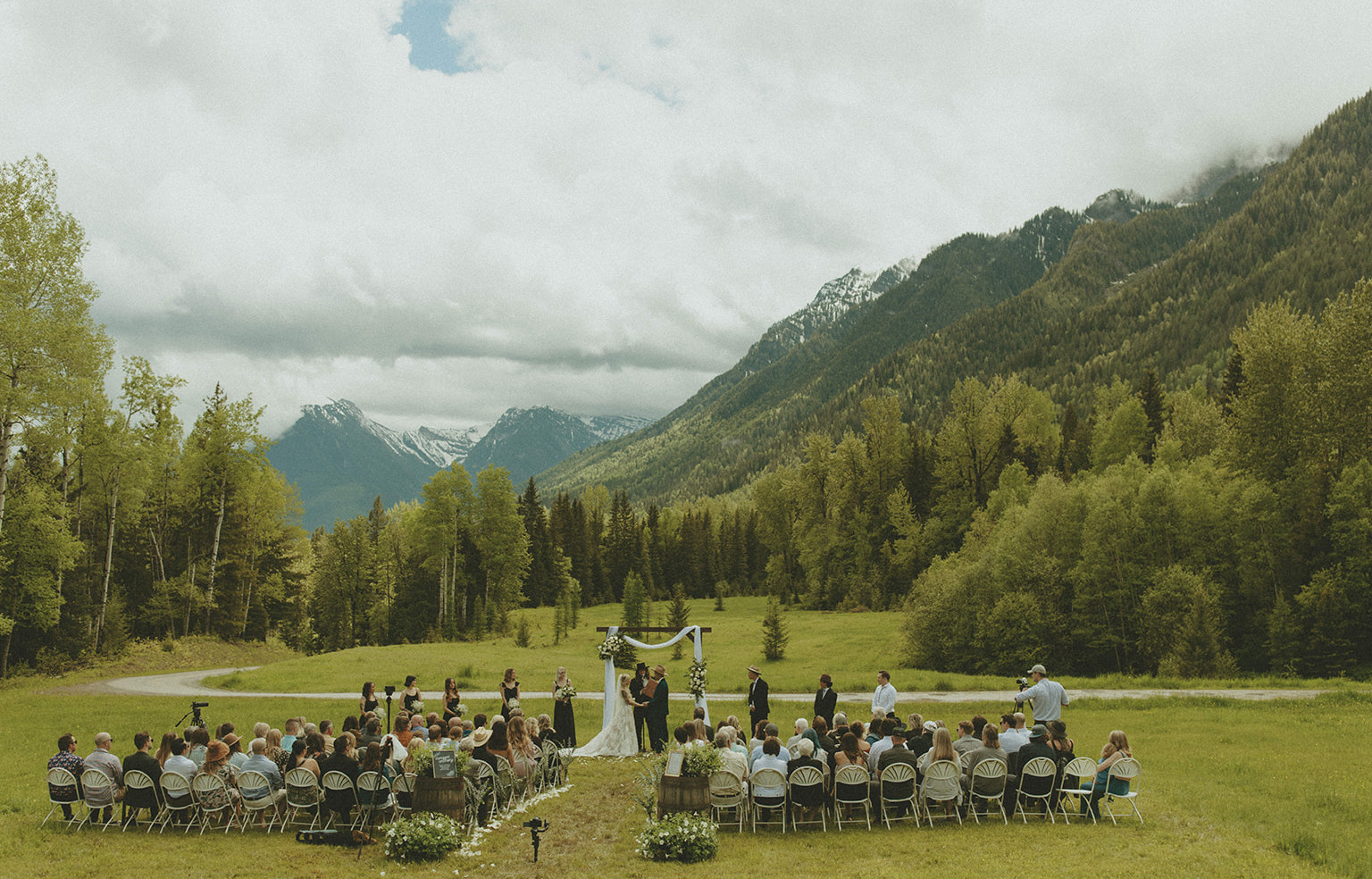Outdoor ceremony in a mountain valley